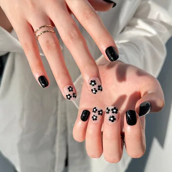 24Pcs Черно носене нокти изкуство сладък малки цветя подвижни фалшиви нокти мини кратко фалшиви нокти натиснете върху ноктите с лепило комплект